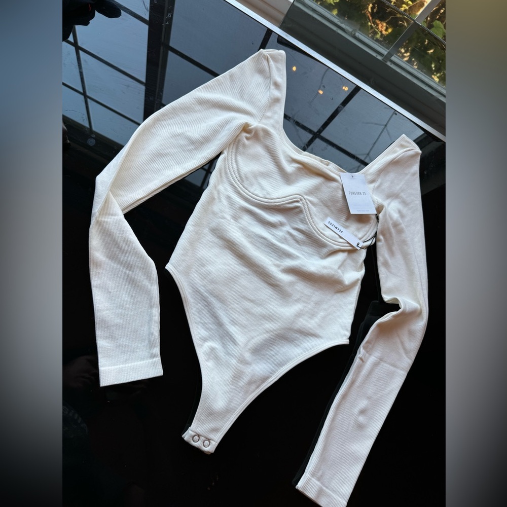Bodysuit New w/tag.